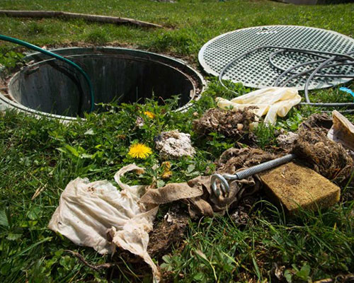 Opening of septic system in yard in Houston